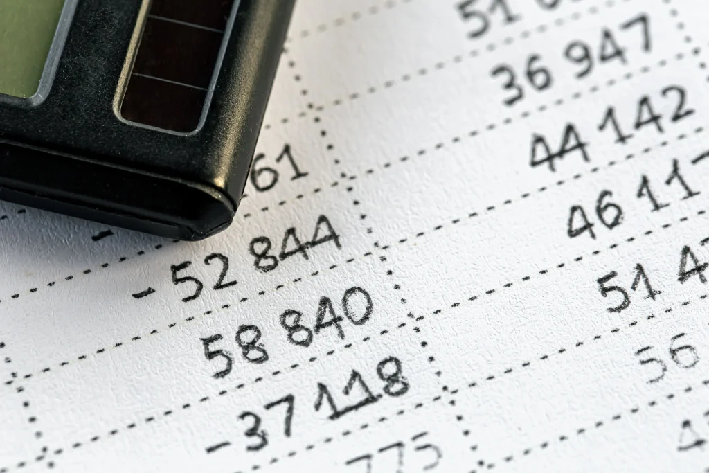 calculator-numbers-paper-closeup-finance-concept | Homesell